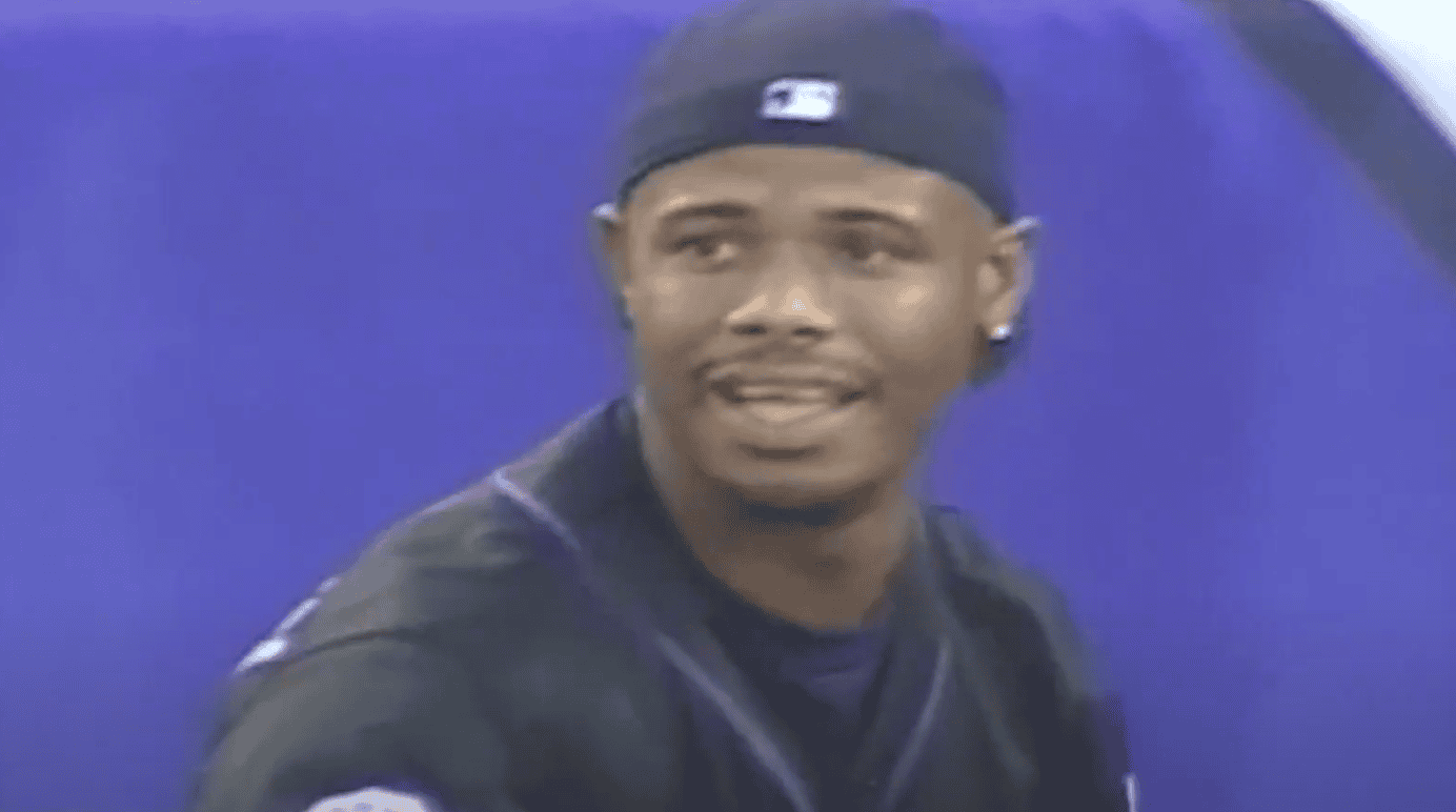 Ken Griffey Jr. joyfully celebrating his iconic victory at the 1998 Home Run Derby.